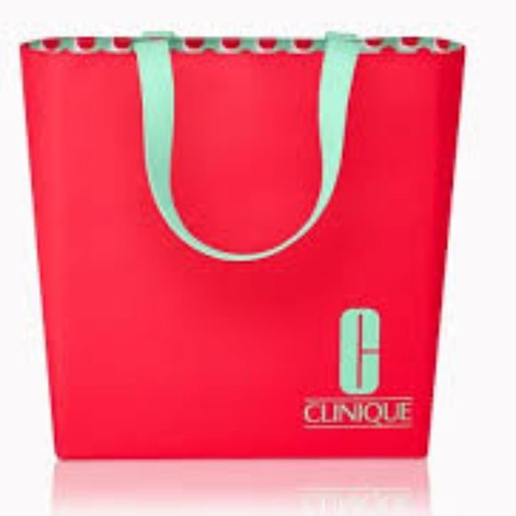 Clinique Handbags - Clinique Red Tote with matching Make-up bag